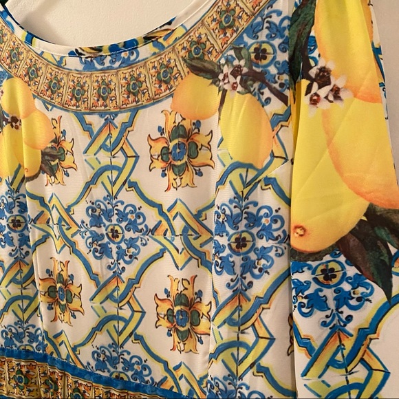 Beautiful lined yellow and blue printed long sleeve dress. Fits size 8 $25 - Picture 2 of 7